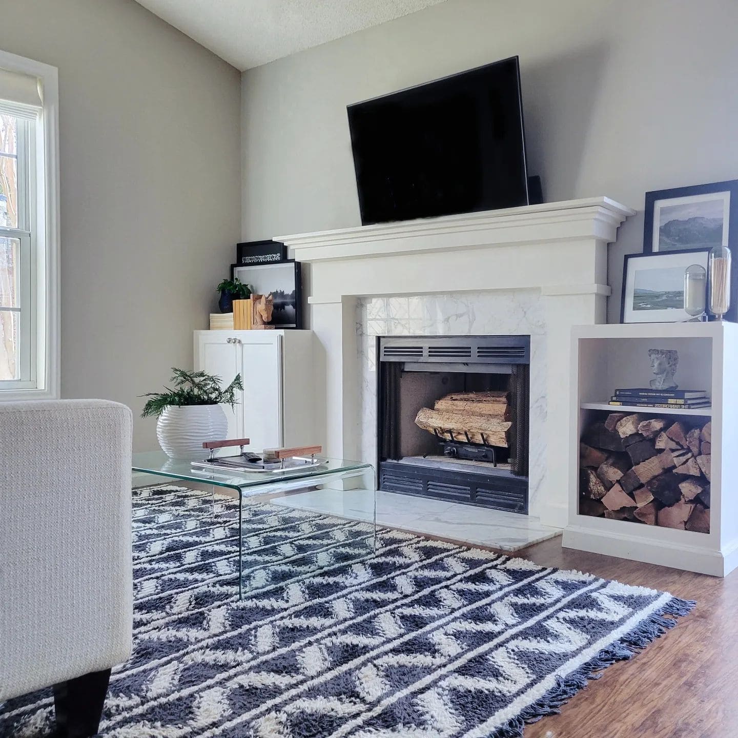 small living room with fireplace and tv